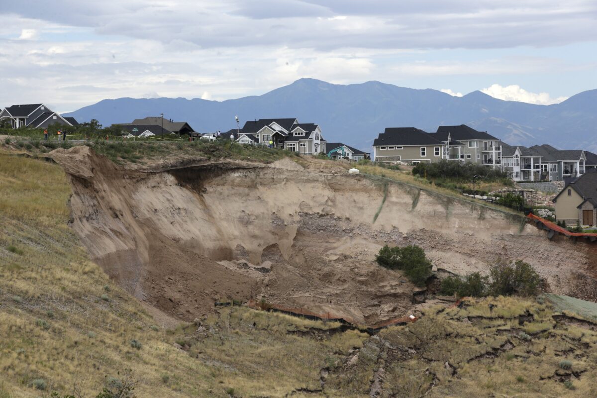 As North Salt Lake landslide creeps, litigants dicker while barrier
